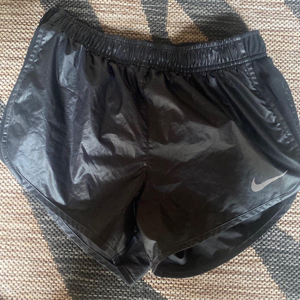 Never worn Nike black shiny gym shorts